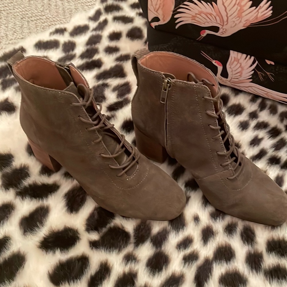 Brown high heeled boots